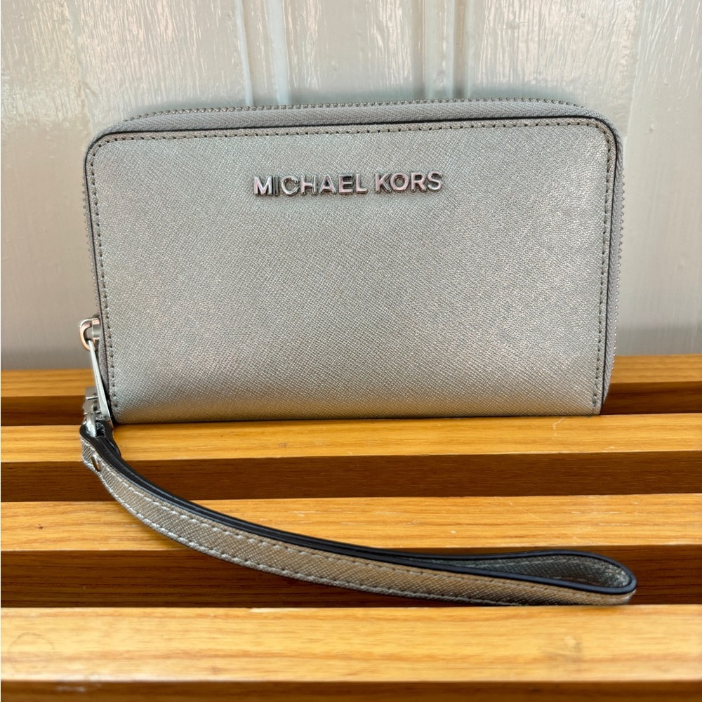 MICHAEL KORS wrist wallet in metallic silver $30